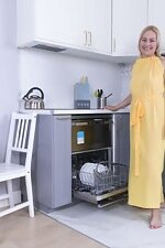 Jane Bushe strips naked in her grey kitchen